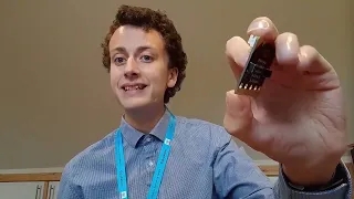 Picture of Mr Morrison holding a micro:bit.