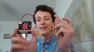 Mr Morrison with micro:bit clicking his fingers.