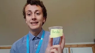 Picture of Mr Morrison holding a small tub labelled 'Pasta'.